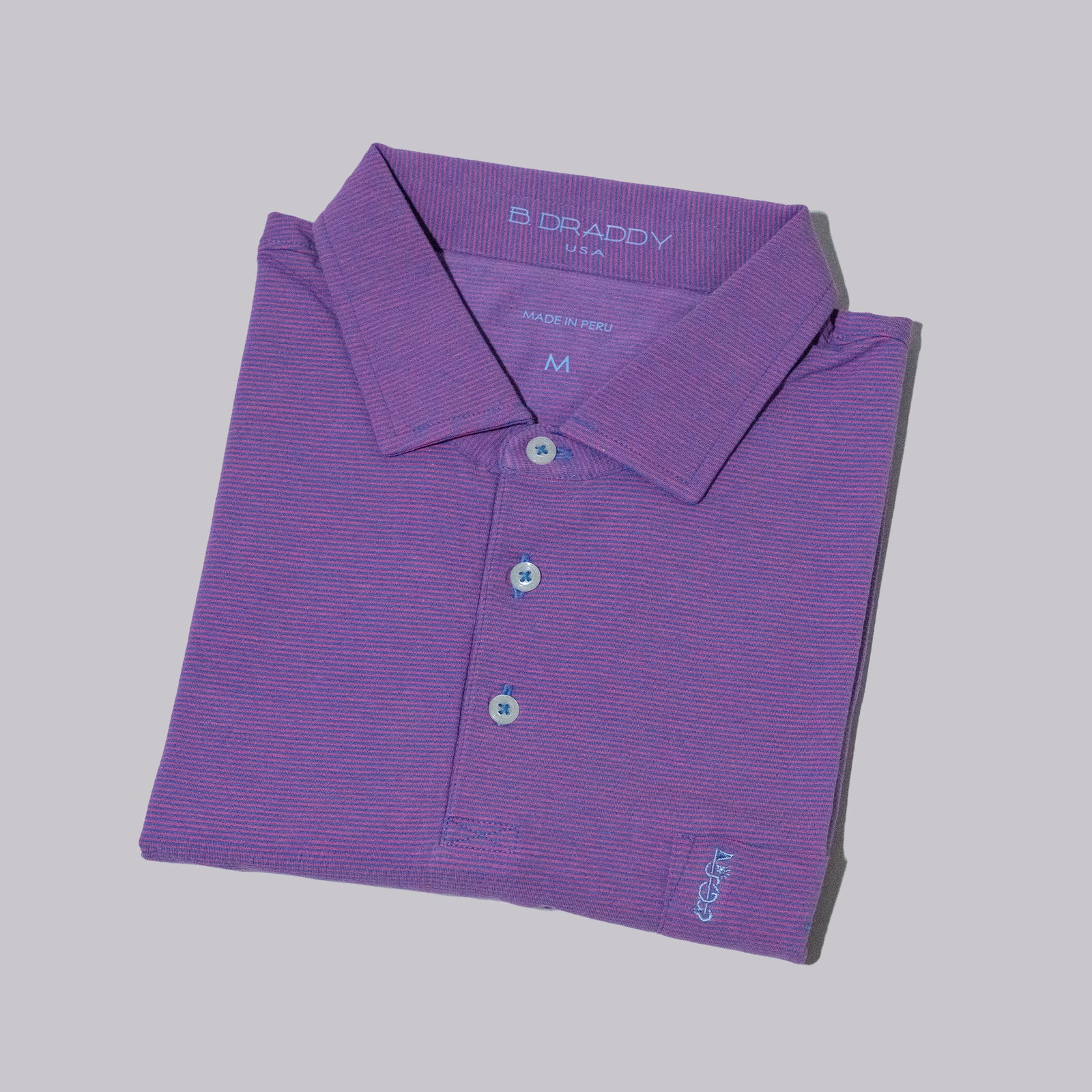 The Shotgun Start & B. Draddy Vin Pocket Polo - Indigo/Pink