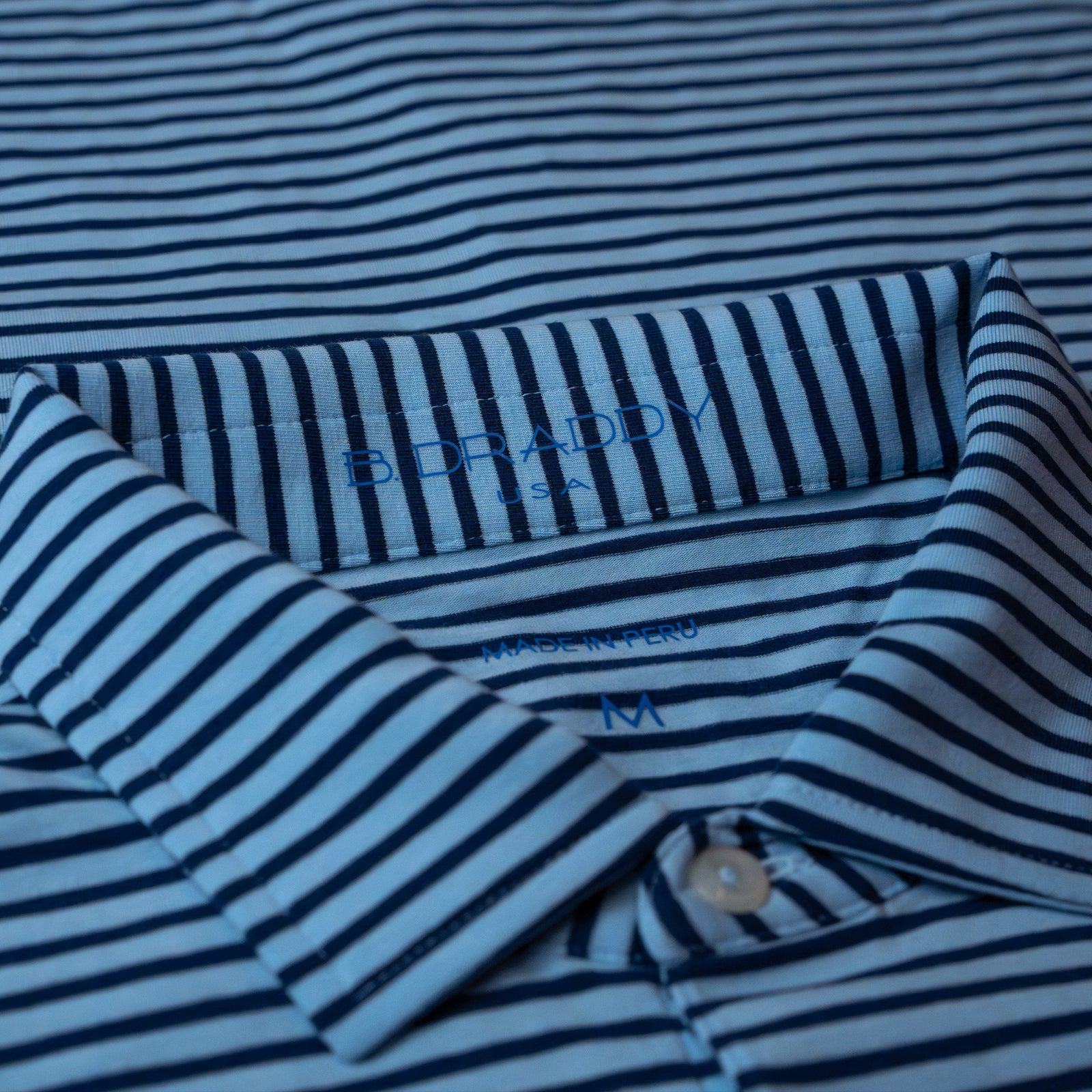 The Shotgun Start & B. Draddy Tommy Polo - Batik/Regal