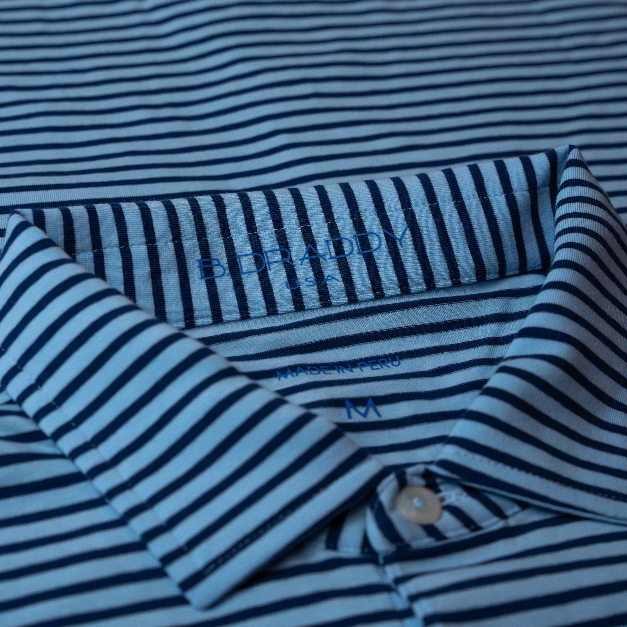 The Shotgun Start & B. Draddy Tommy Polo - Batik/Regal